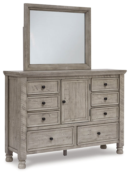 Harrastone King Panel Bed with Mirrored Dresser, Chest and 2 Nightstands