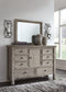 Harrastone Queen Panel Bed with Mirrored Dresser, Chest and 2 Nightstands